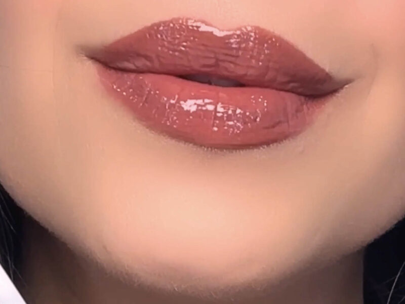 Rosy nude lips wearing Velvet LipSense with Glossy Gloss